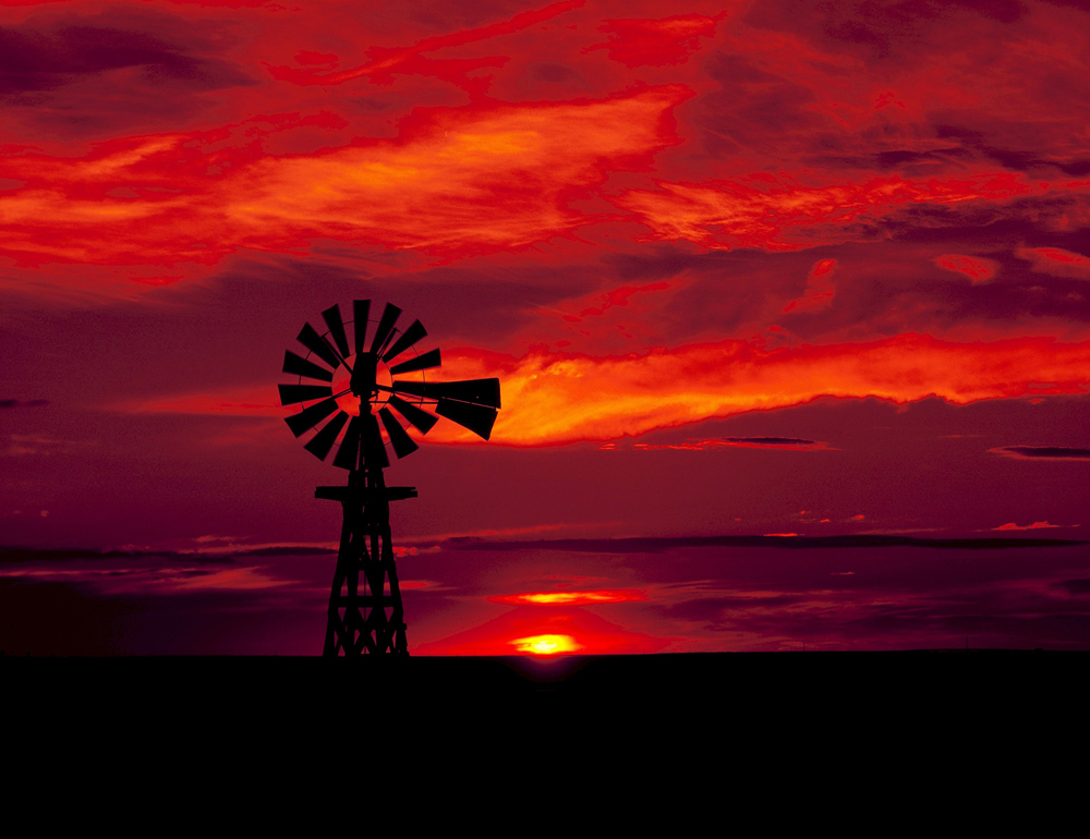 As he gazed out onto the landscape towards the setting Sun, the sky suddenly turned to a liquid and then turned blood-red. As he gazed out onto the landscape towards the setting Sun, the sky suddenly turned to a liquid and then turned blood-red.